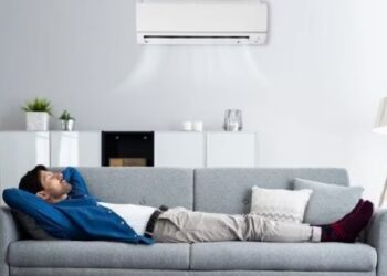 sleeping under an AC